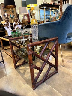 A pair of Italian 1970s bamboo and green smoked glass side or bedside tables