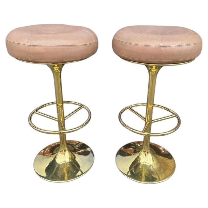 A pair of Italian 1970s gilt metal and leather bar stools For Sale