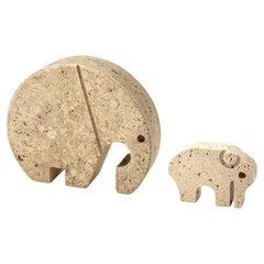 A pair of Italian 1970s travertine elephants by Fratelli Mannelli