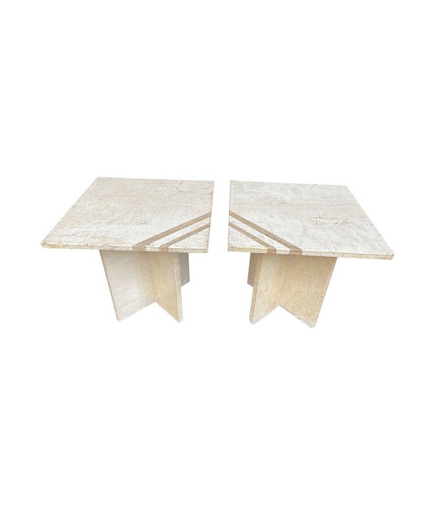 A pair of Italian 1970s travertine side / bedside tables with brass inlay detail and crossed travertine bases.