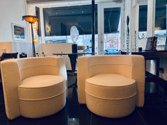 A pair of Italian 70s club chairs in lambswool fabric