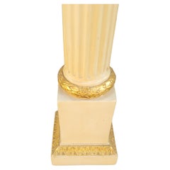 A Pair of Italian Art Deco Patinated and Gilt Ornate Plaster Tower Table Lamps