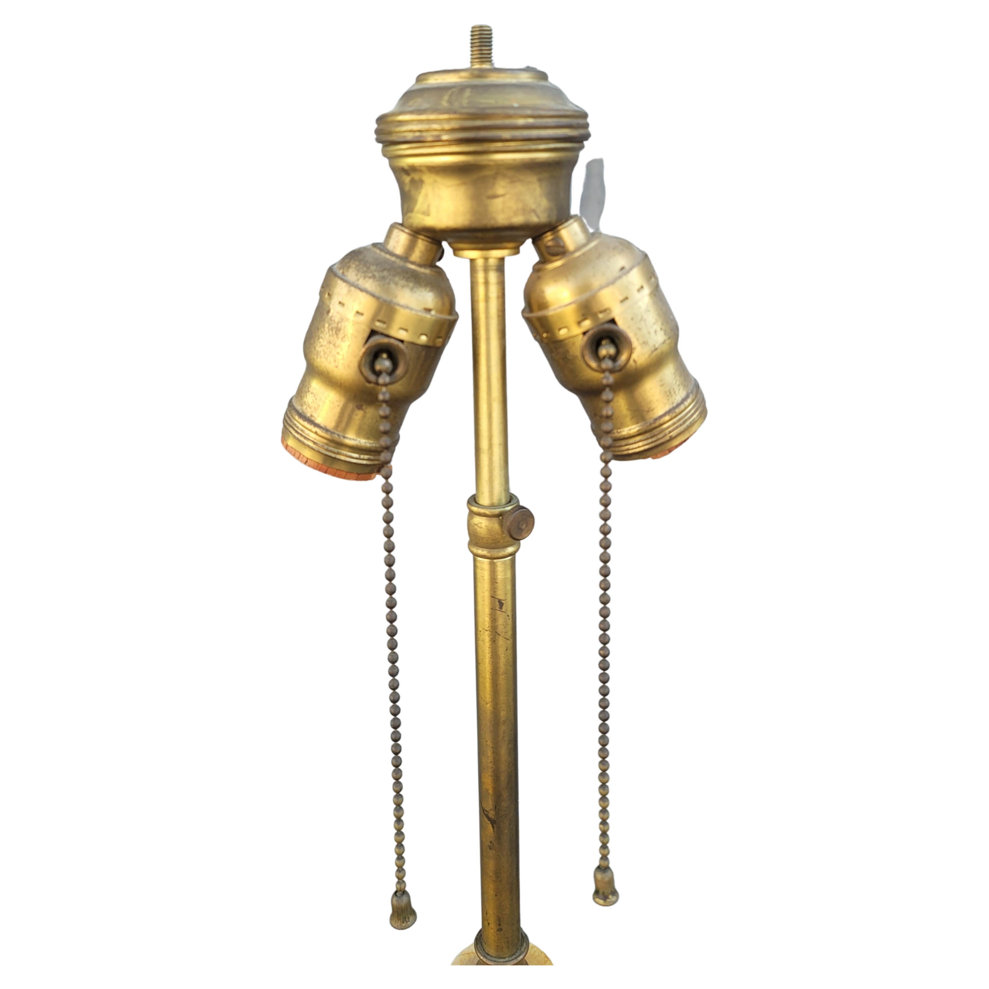 American A Pair of Italian Art Deco Patinated and Gilt Ornate Plaster Tower Table Lamps For Sale