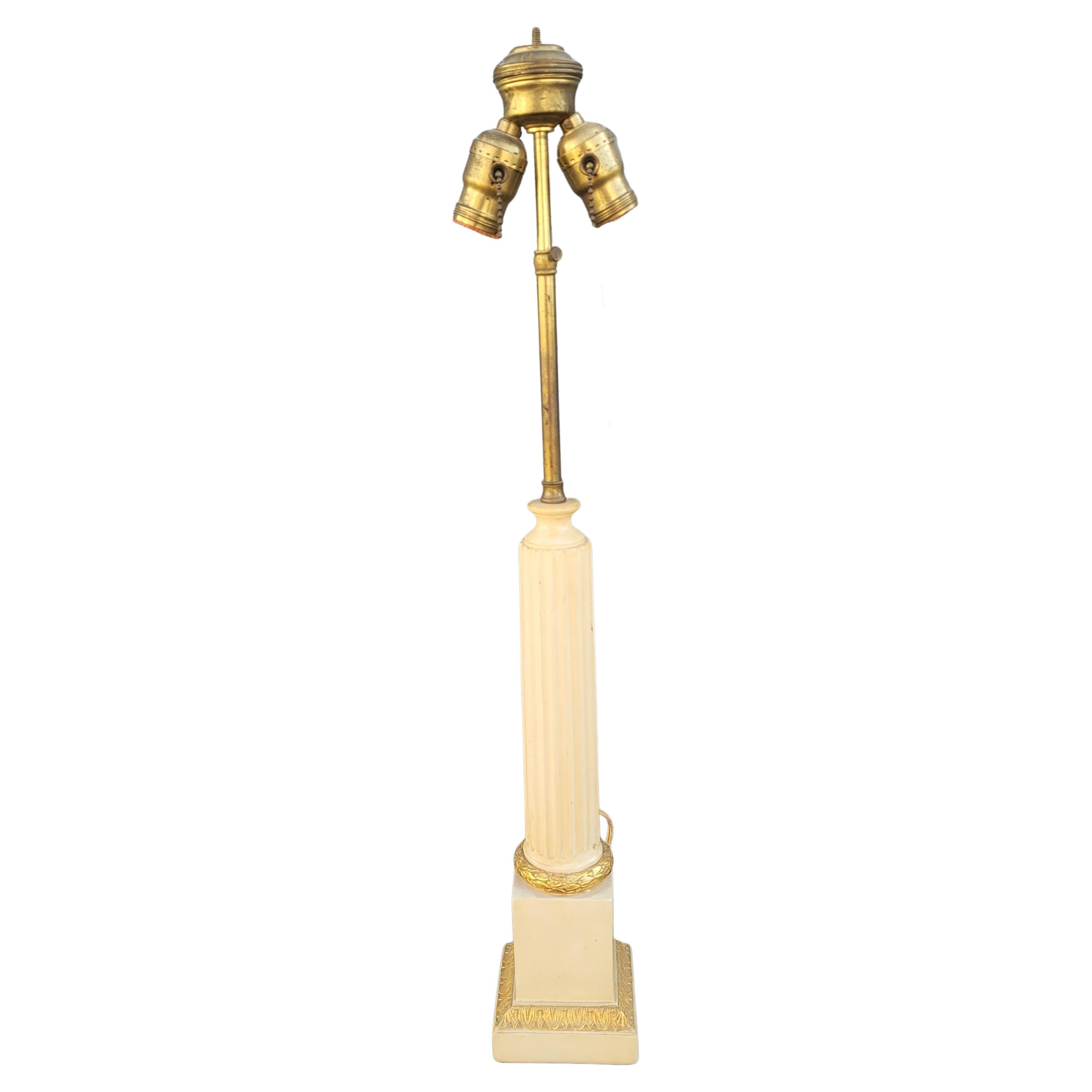 A Pair of Italian Art Deco Patinated and Gilt Ornate Plaster Tower Table Lamps In Good Condition For Sale In Germantown, MD