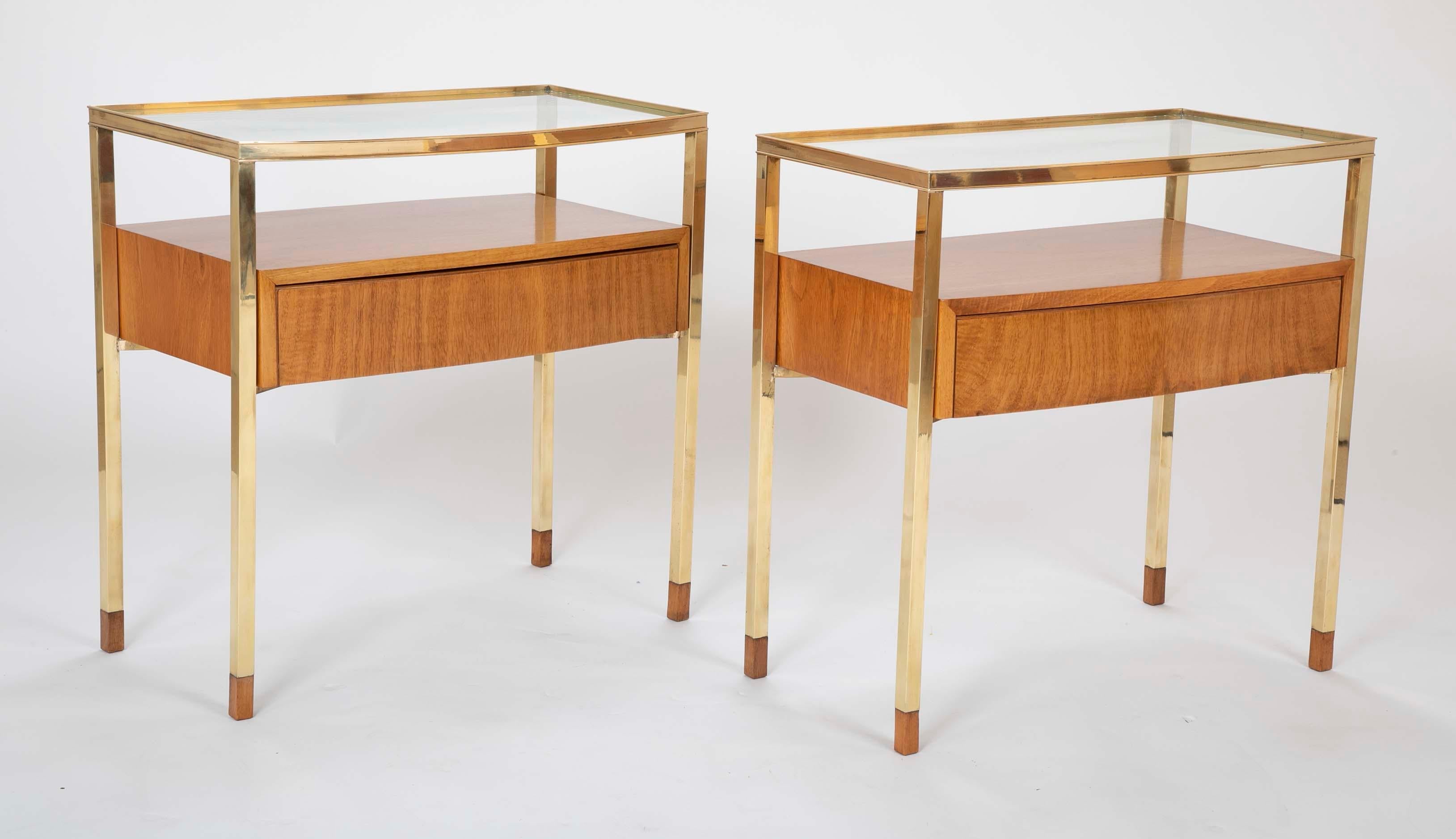 A striking pair of bleached mahogany Italian side tables with brass armature. Feet are tipped with bleached mahogany.