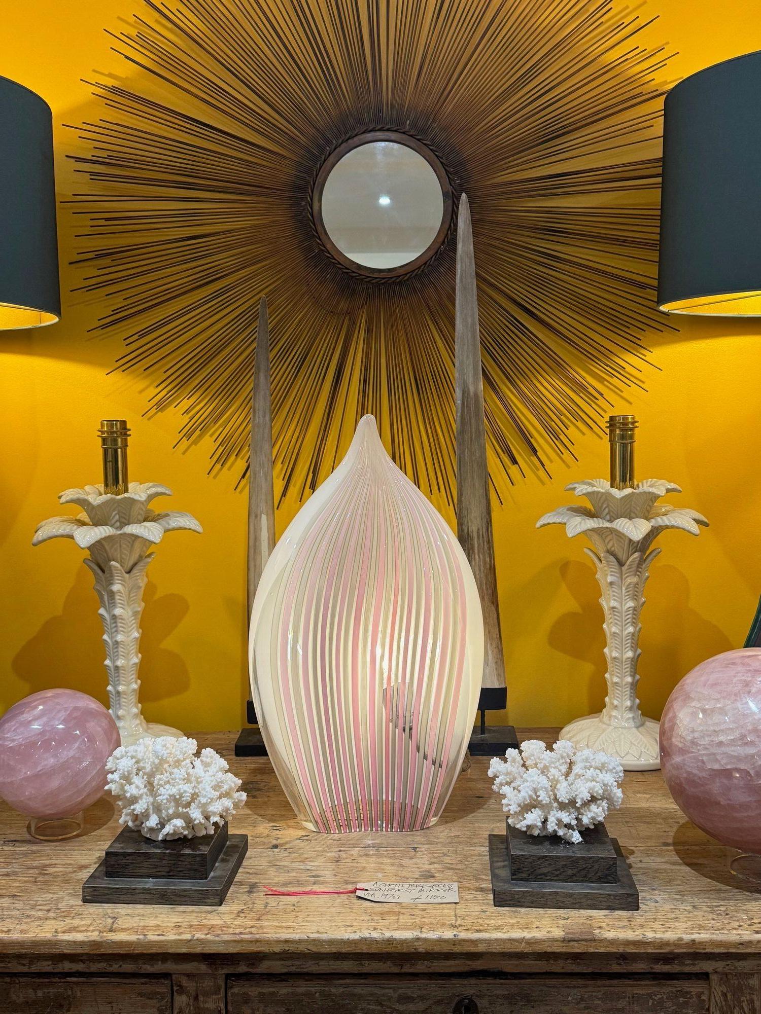 A pair of Italian ceramic 1970s palm tree lamps in the style of Tommaso Barbi with brass stems and fittings. The ceramic bases were made in Italy and stamped 