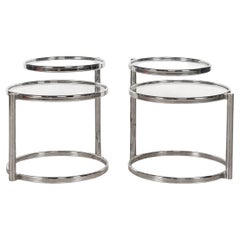 A Pair Of Italian Chrome
Glass Two-Tier "Swivel" Side Tables, c.1970 A Pair Of Italian Chrome
Glass Two-Tier "Swivel" Side Tables, c.1970