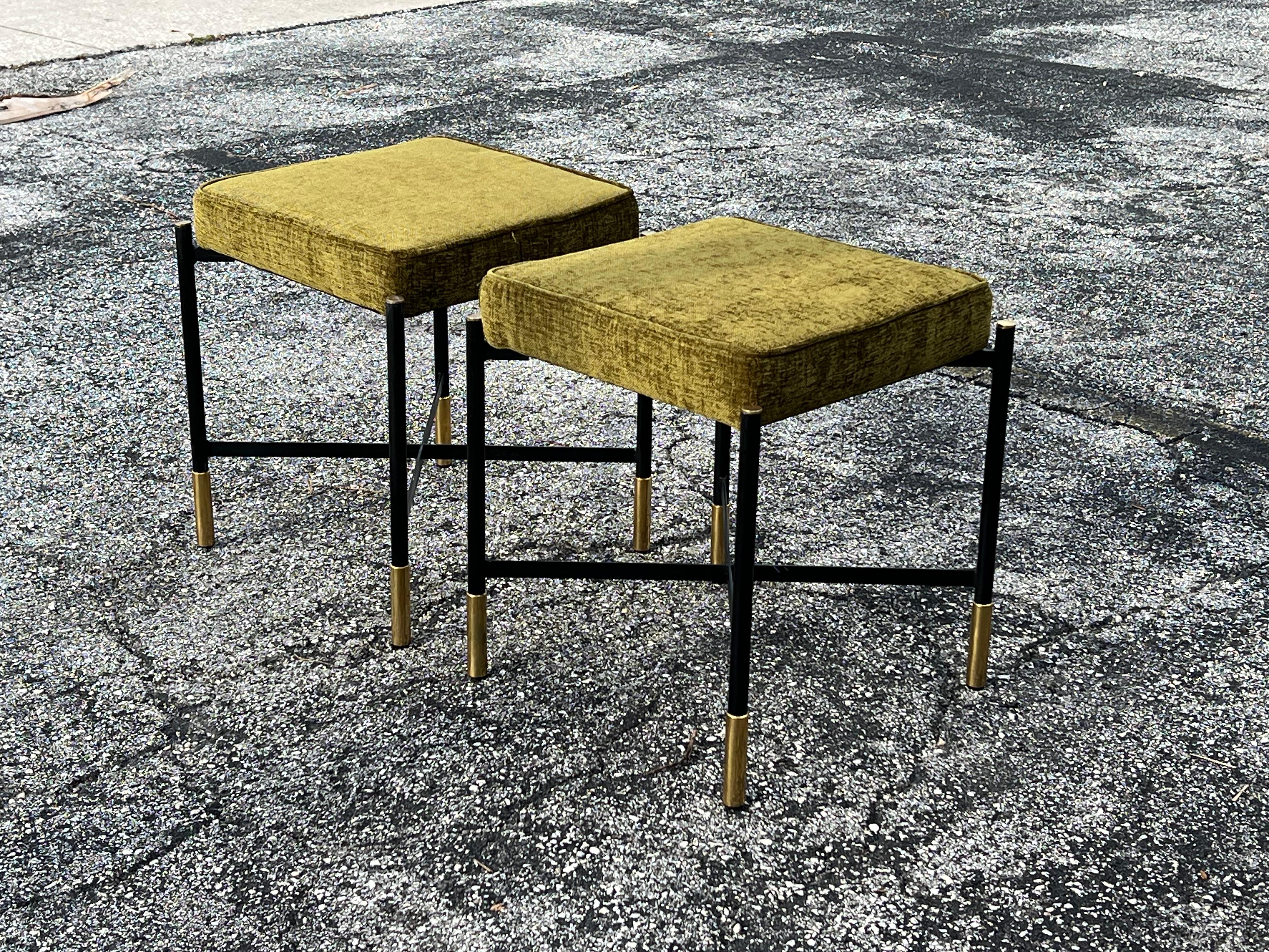A pair of elegant Italian upholstered stools, ca' 1990's. Made of brass and steel, heavy construction with cross braces. 