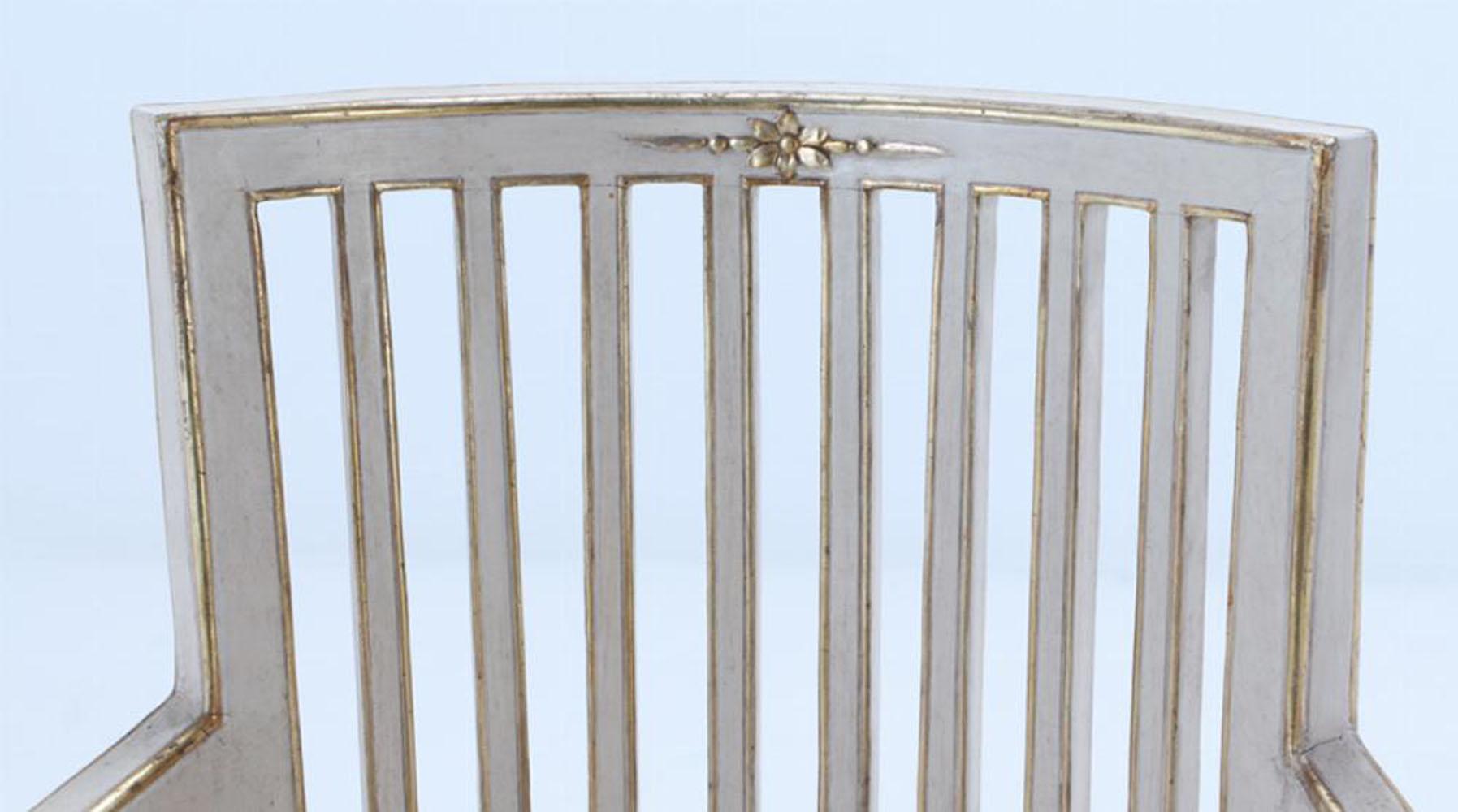 19th Century A Pair of Italian Directoire painted and gilt open arm chairs, C 1800. For Sale
