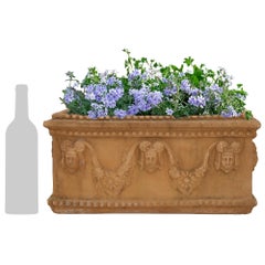 A pair of Italian early 19th century Neo-Classical st. Terra Cotta planters