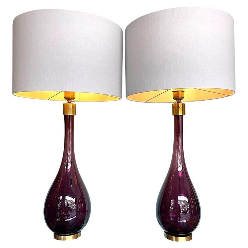 A pair of Italian large purple Murano glass and brass teardrop shaped lamps