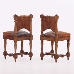 A pair of Italian mahogany "upright" small side chairs, 19th C.