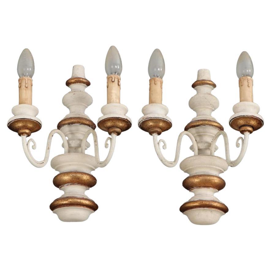 A pair of Italian painted wood sconces, C. 1950.