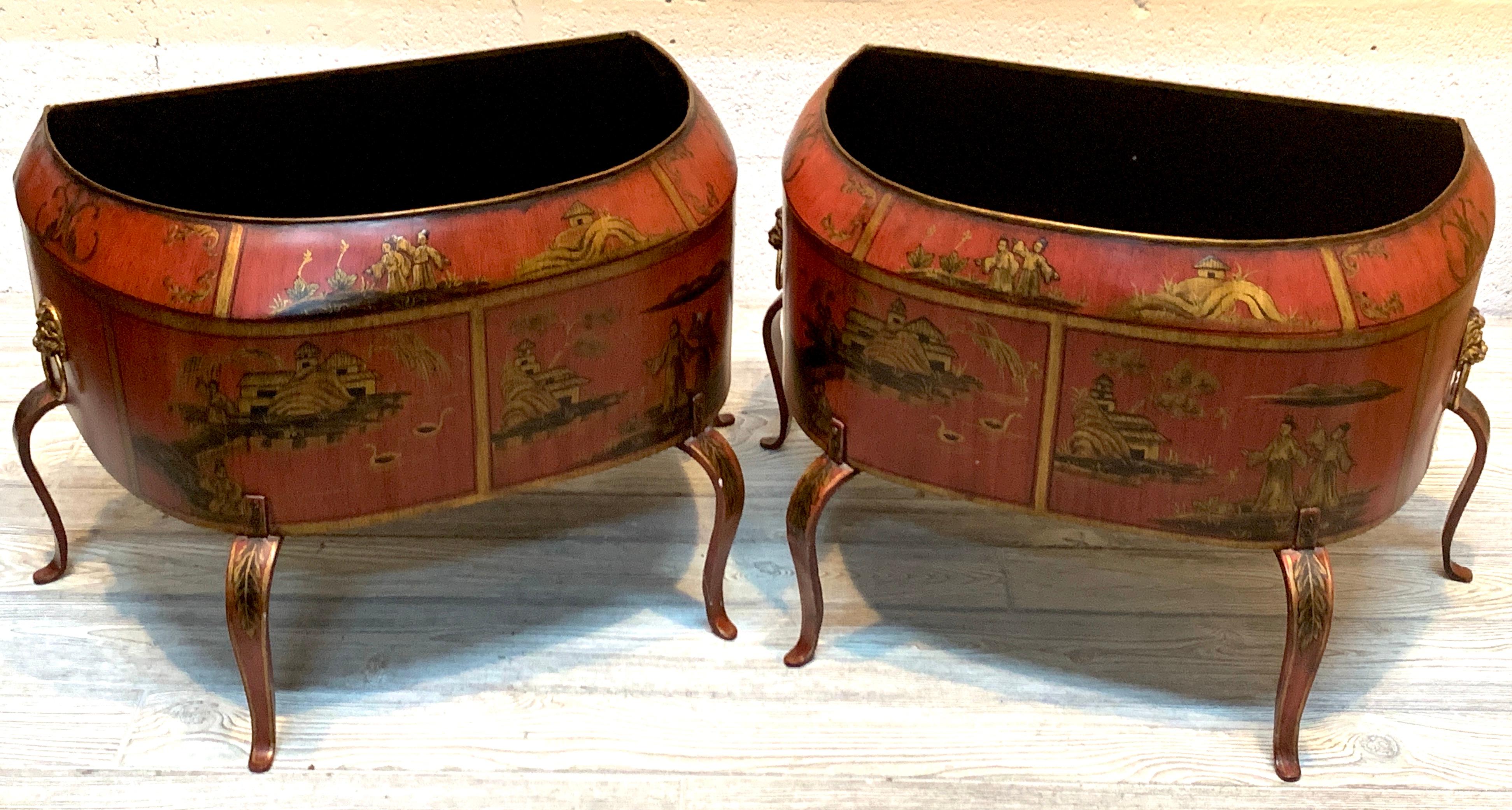 A pair of Italian red tole chinoiserie gilt decorated floor planters, each one of demilune form with a interior measurement of 21.5