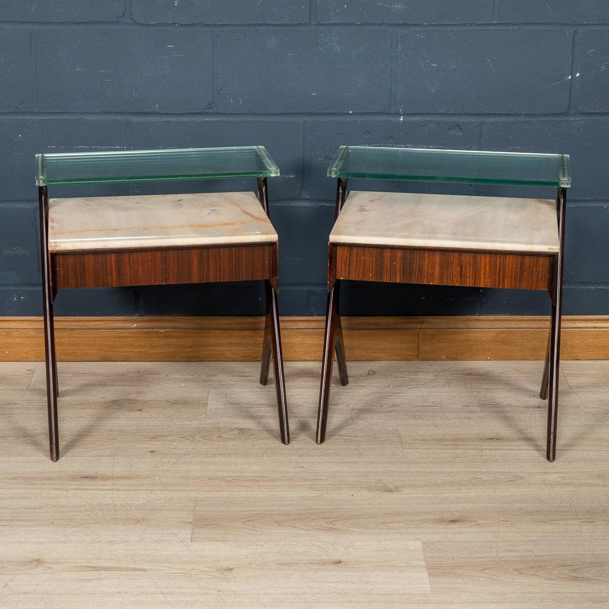 A very elegant pair of side tables designed by Vittorio, Alessandro and Plinio Dassi and produced in Lissone by Dassi, made in Italy in the middle of the 20th century. These wonderful side tables have executed in rosewood veneer and birch wood. The