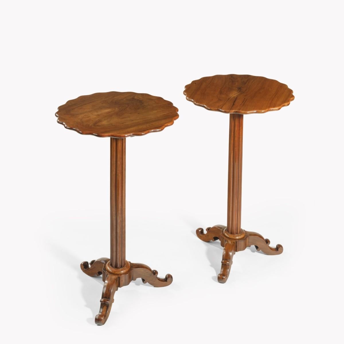 A pair of Italian solid olive wood side tables, each with a shaped circular top raised on a fluted support and scrolling tripod feet, (possibly Sorrento.) Italian, circa 1870.

Measures: Height 29 ½ inches   Width 16 ½ inches.