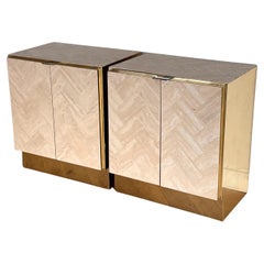 A pair of Italian travertine nightstands with brass accents by Ello, circa 1970