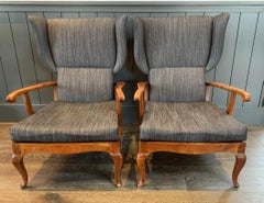 A Pair of Italian Walnut Open Arm Wing Chairs