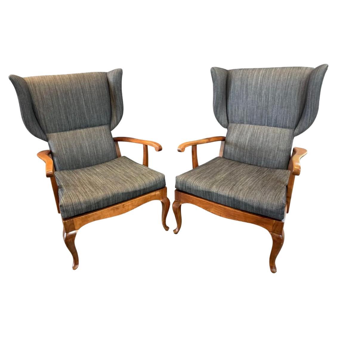 A Pair of Italian Walnut Open Arm Wing Chairs For Sale