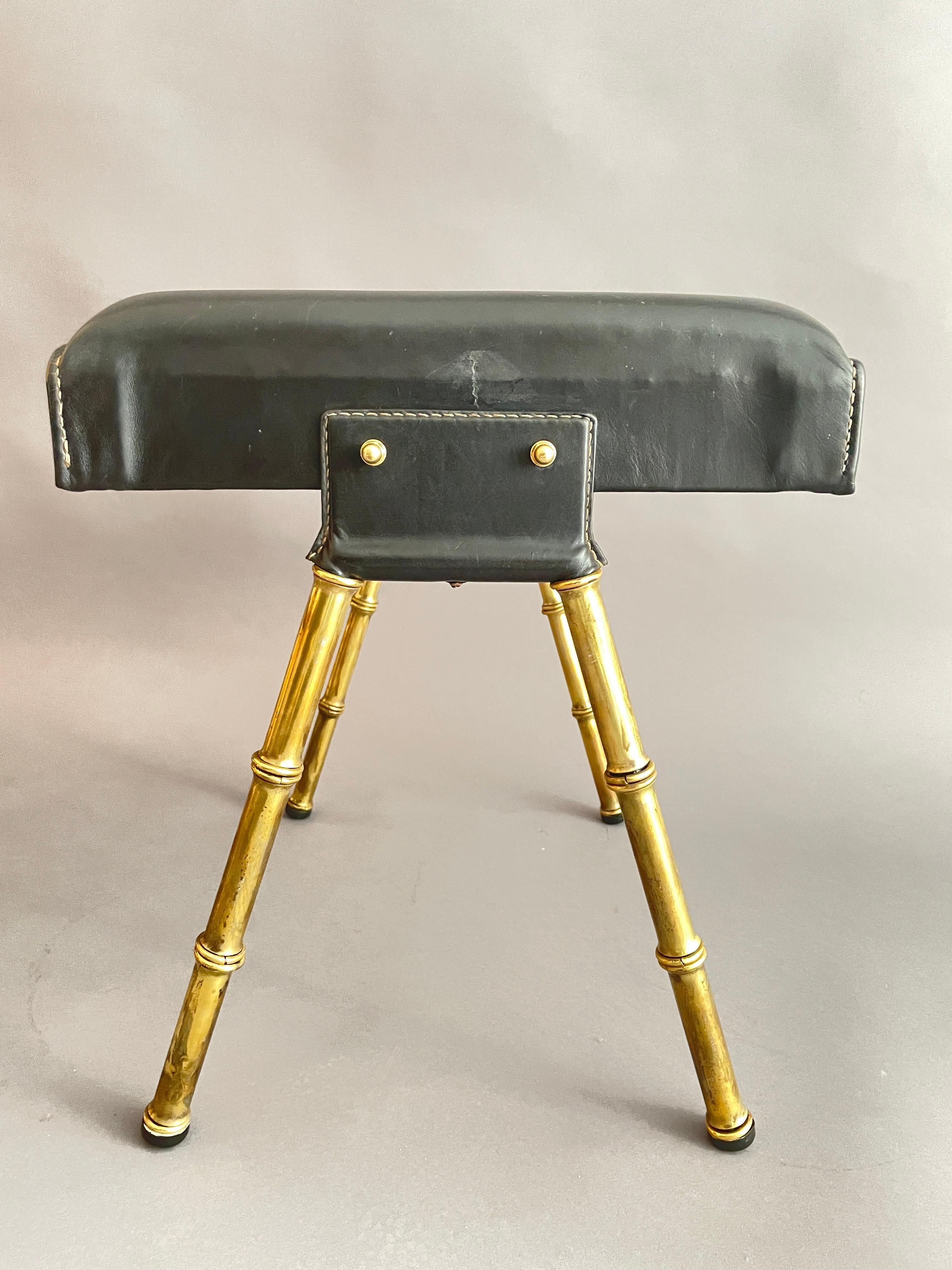 A pair of Jacques Adnet black leather and brass stools For Sale 4