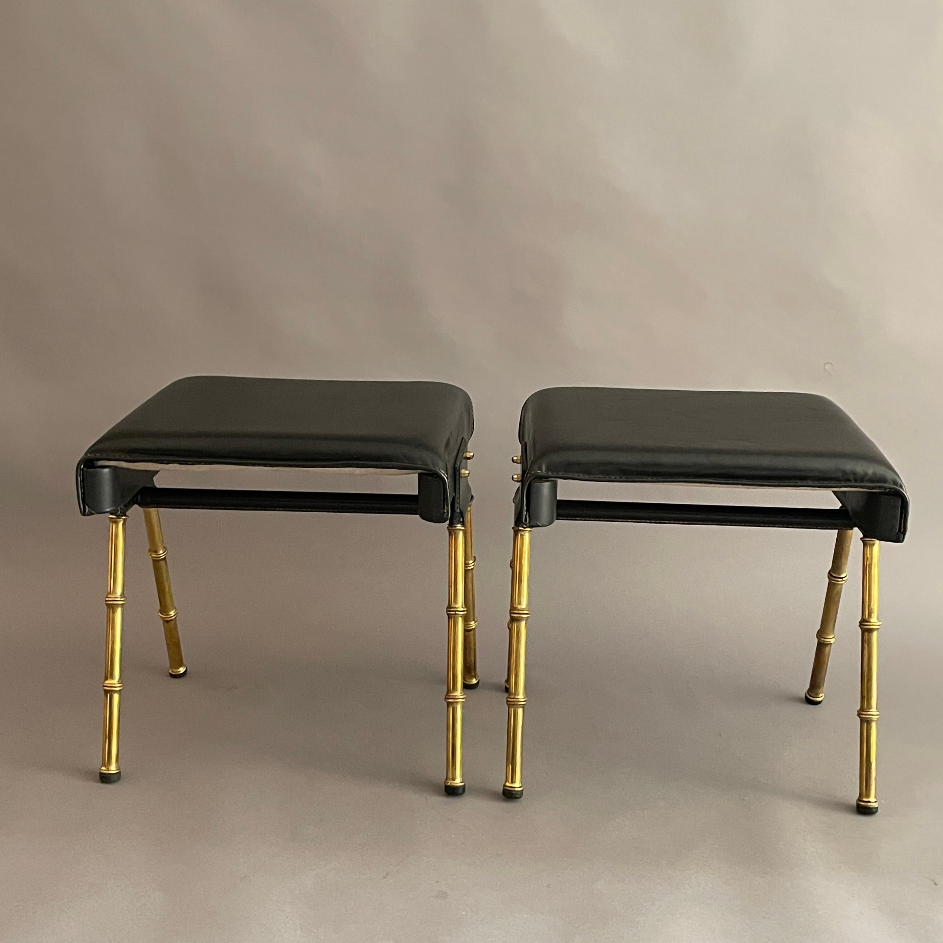 A pair of Jacques Adnet black leather and brass stools For Sale 2