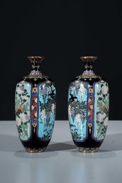 A pair of Japanese Cloisonné vases with naturalistic floral decoration