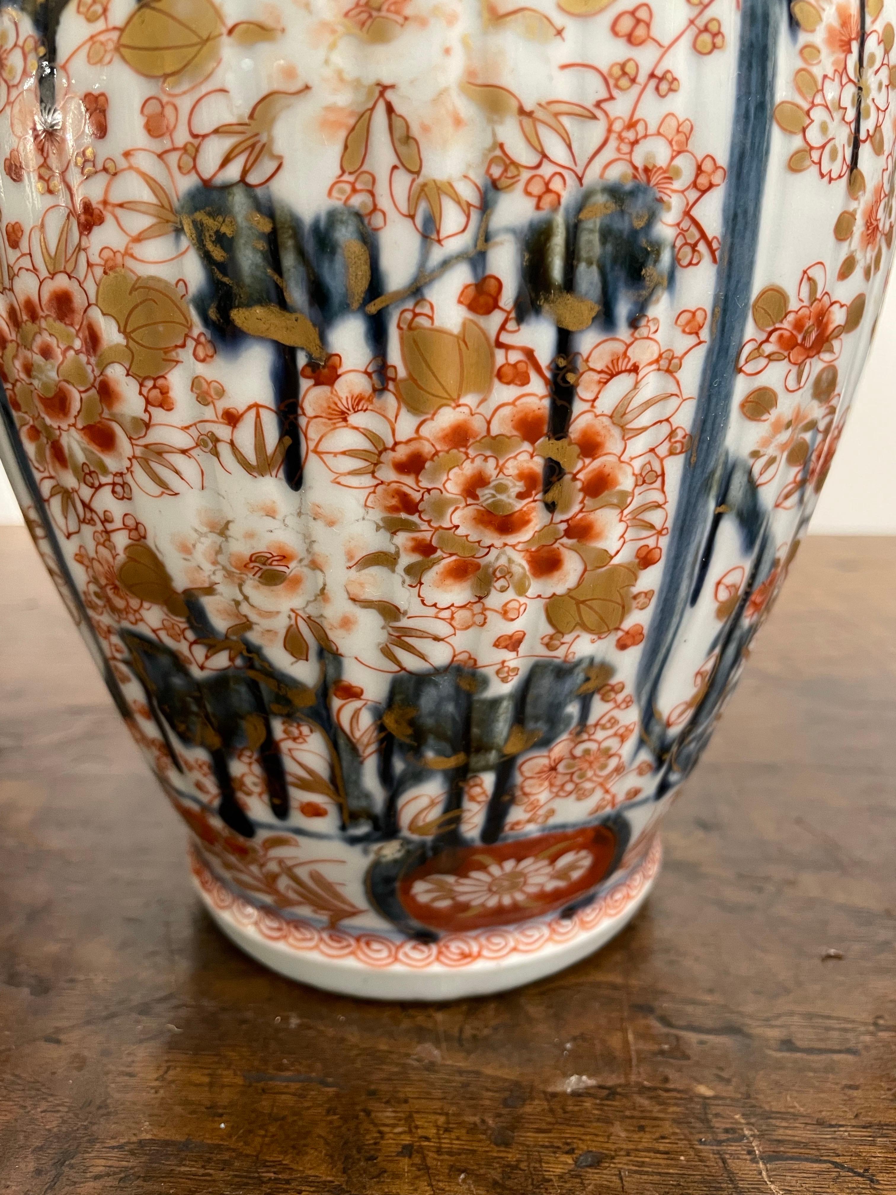 Porcelain A Pair of Japanese Lidded Imari Vases, 19th Century For Sale