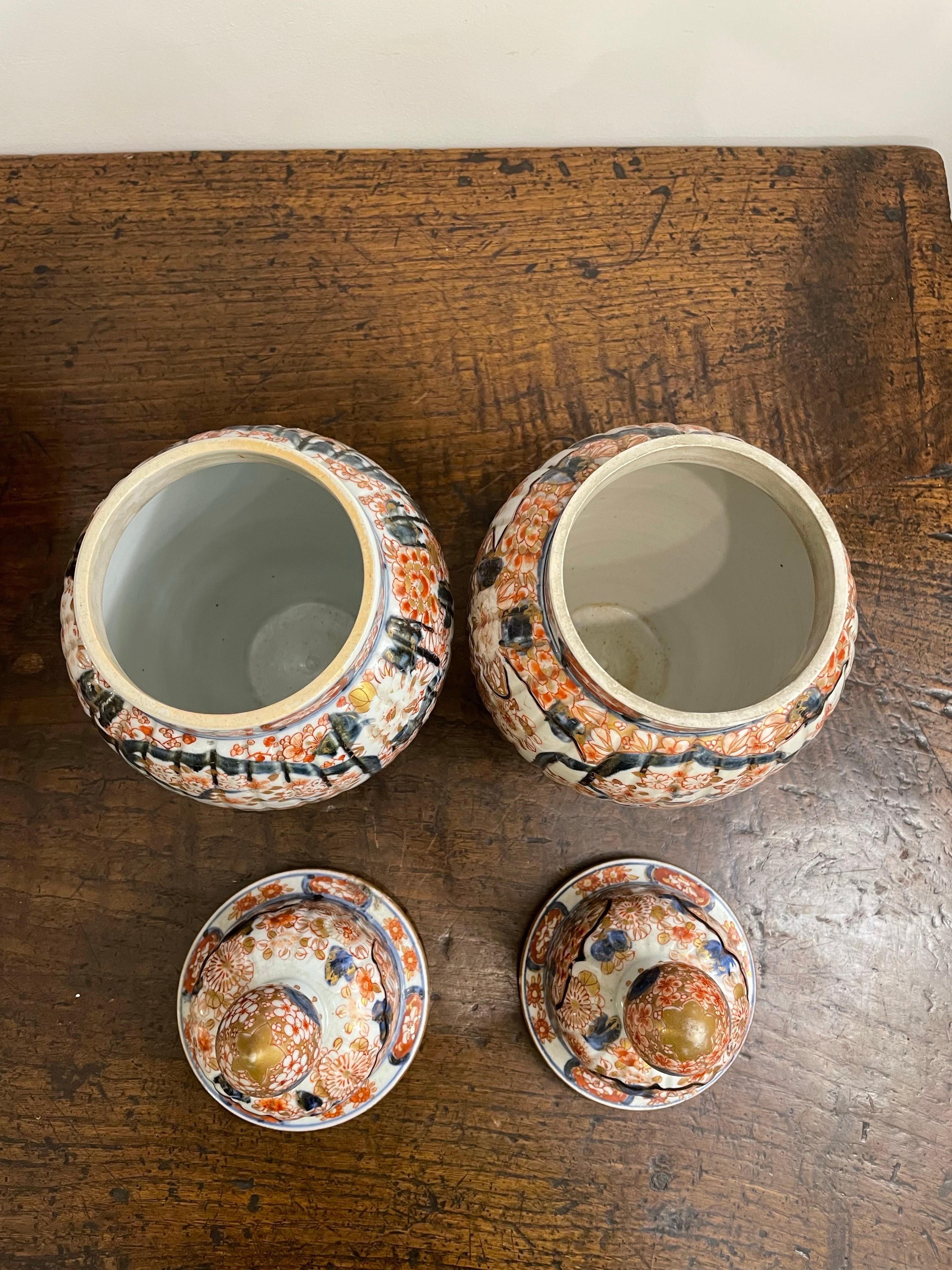 A Pair of Japanese Lidded Imari Vases, 19th Century For Sale 3