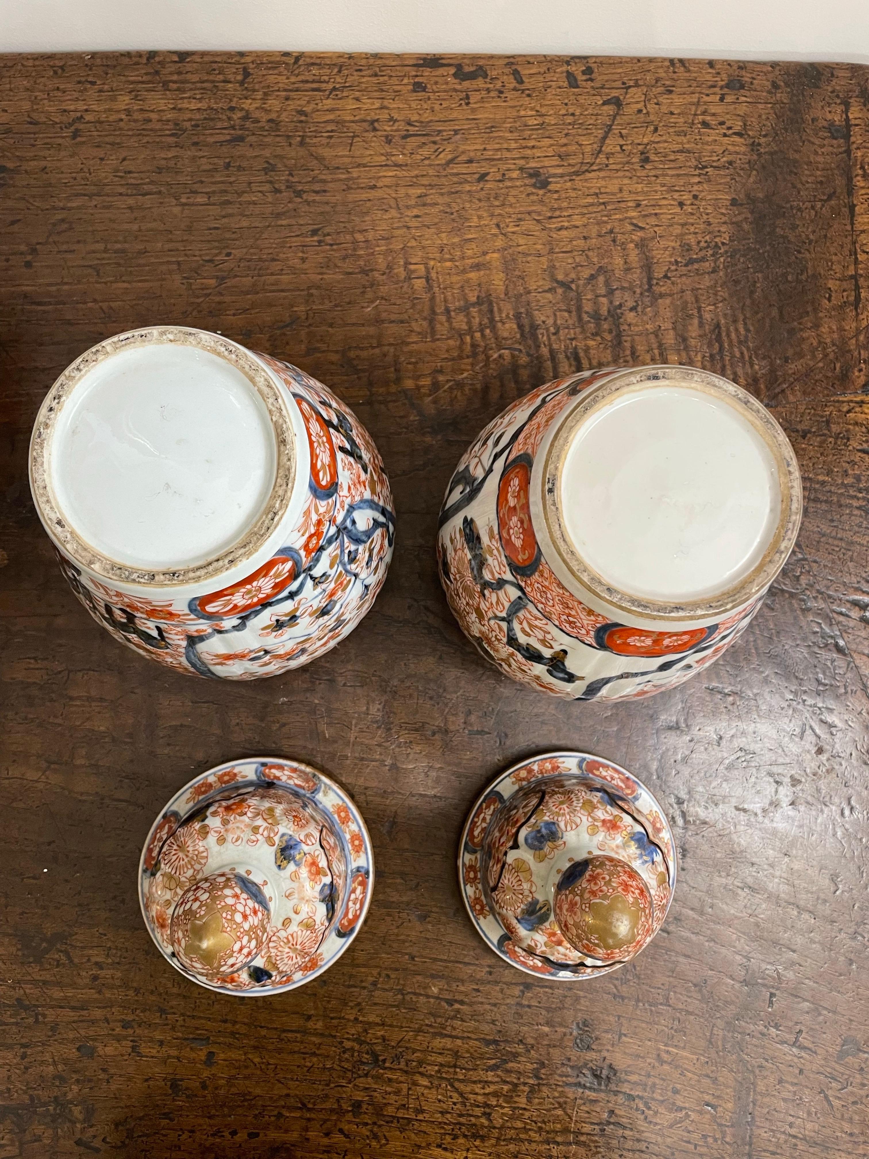 A Pair of Japanese Lidded Imari Vases, 19th Century For Sale 4