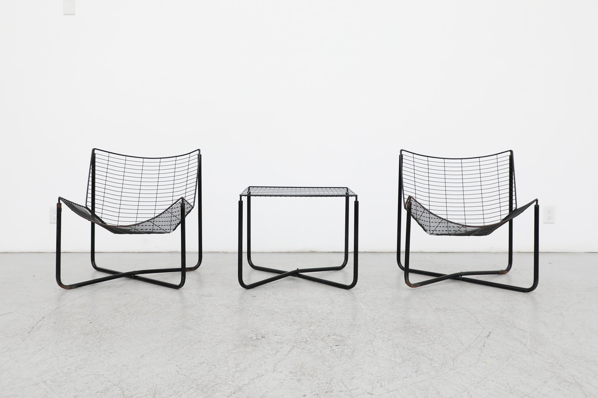 Mid-Century Modern A pair of 'Järpen' easy chairs and side table by Niels Gammelgaard
