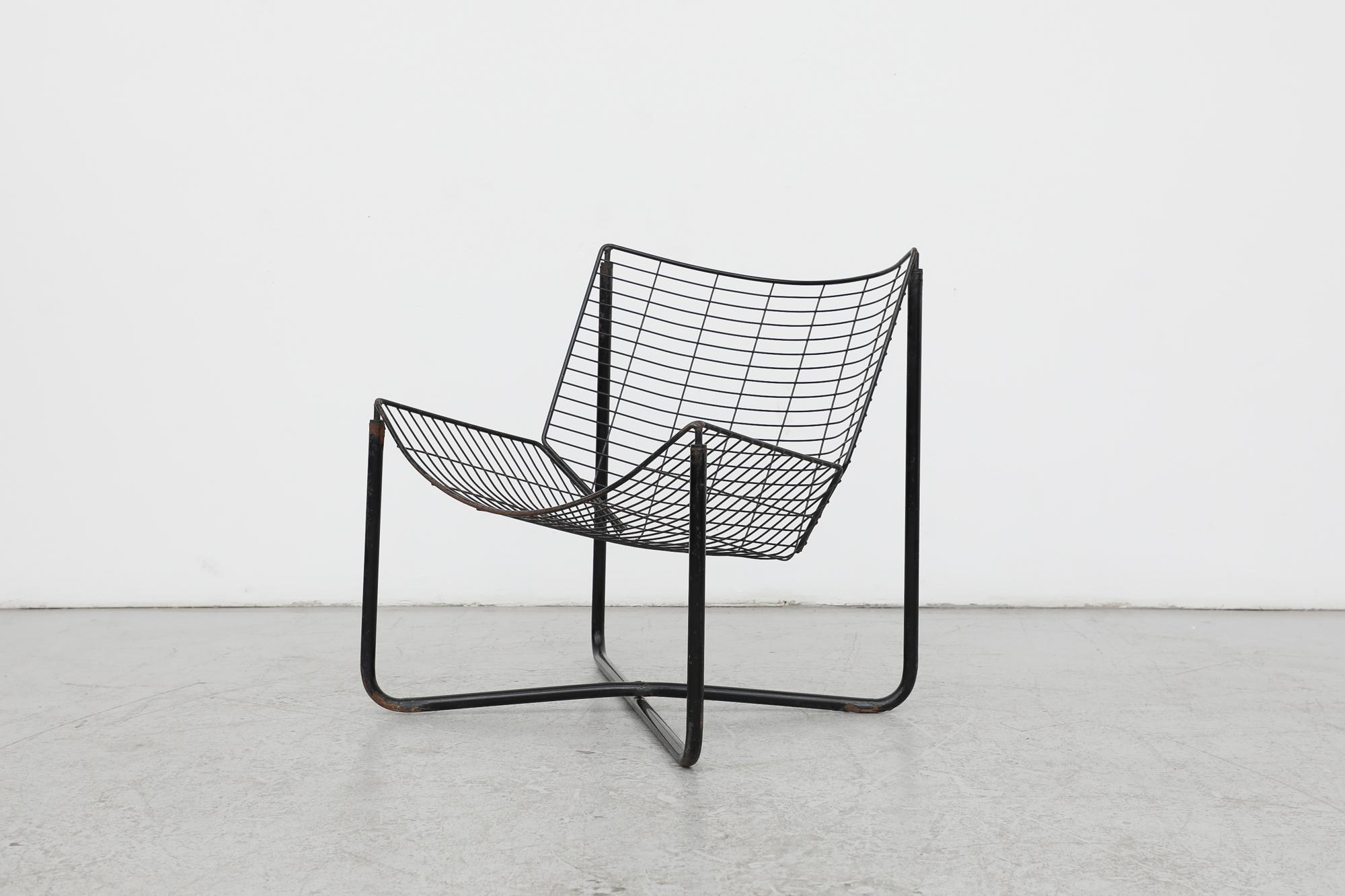 Metal A pair of 'Järpen' easy chairs and side table by Niels Gammelgaard