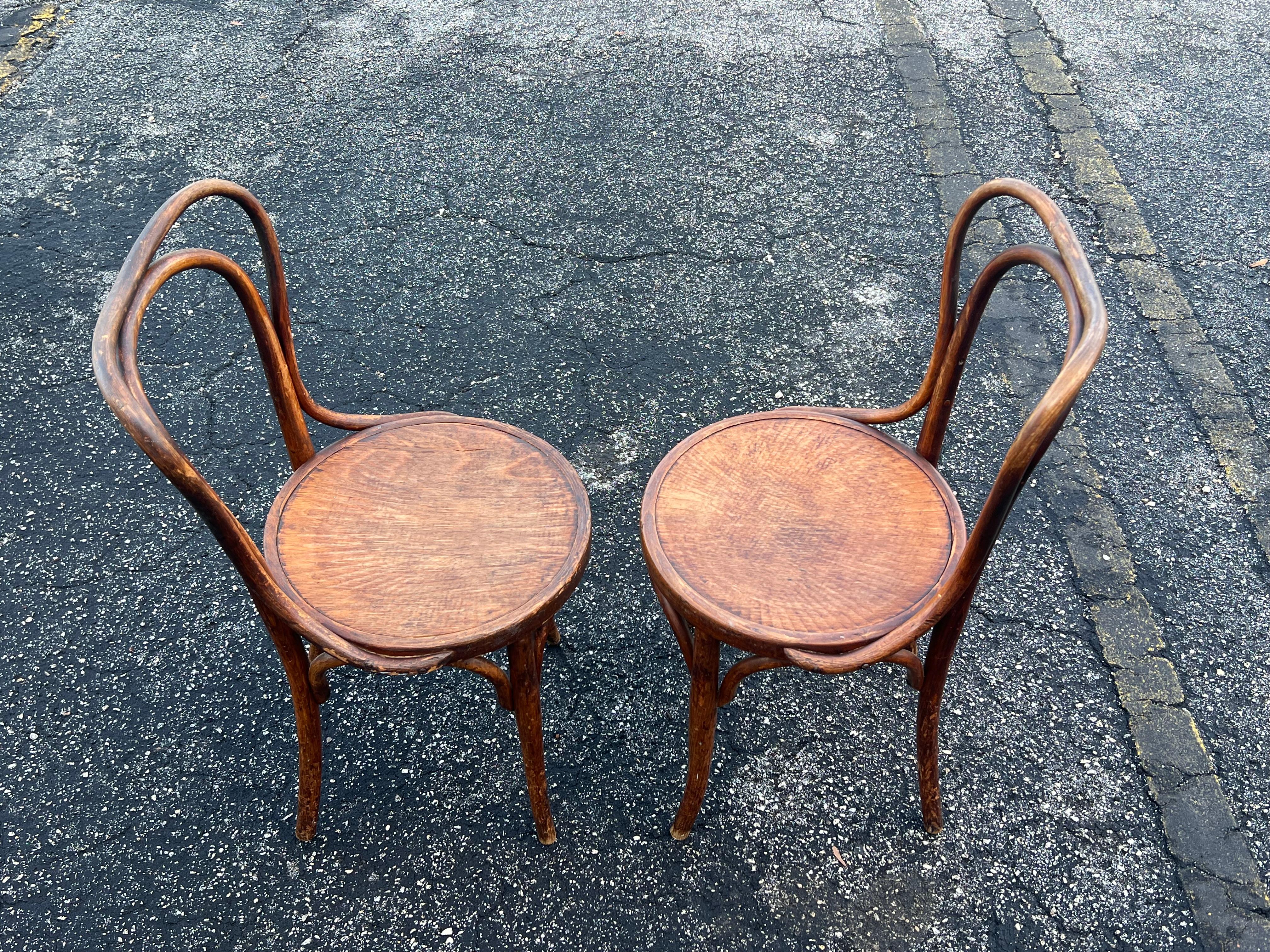 A pair of Jacob and Joseph Kohn side/cafe chairs with a beautiful patina. Made of beech ca' 1890's, signed underneath.