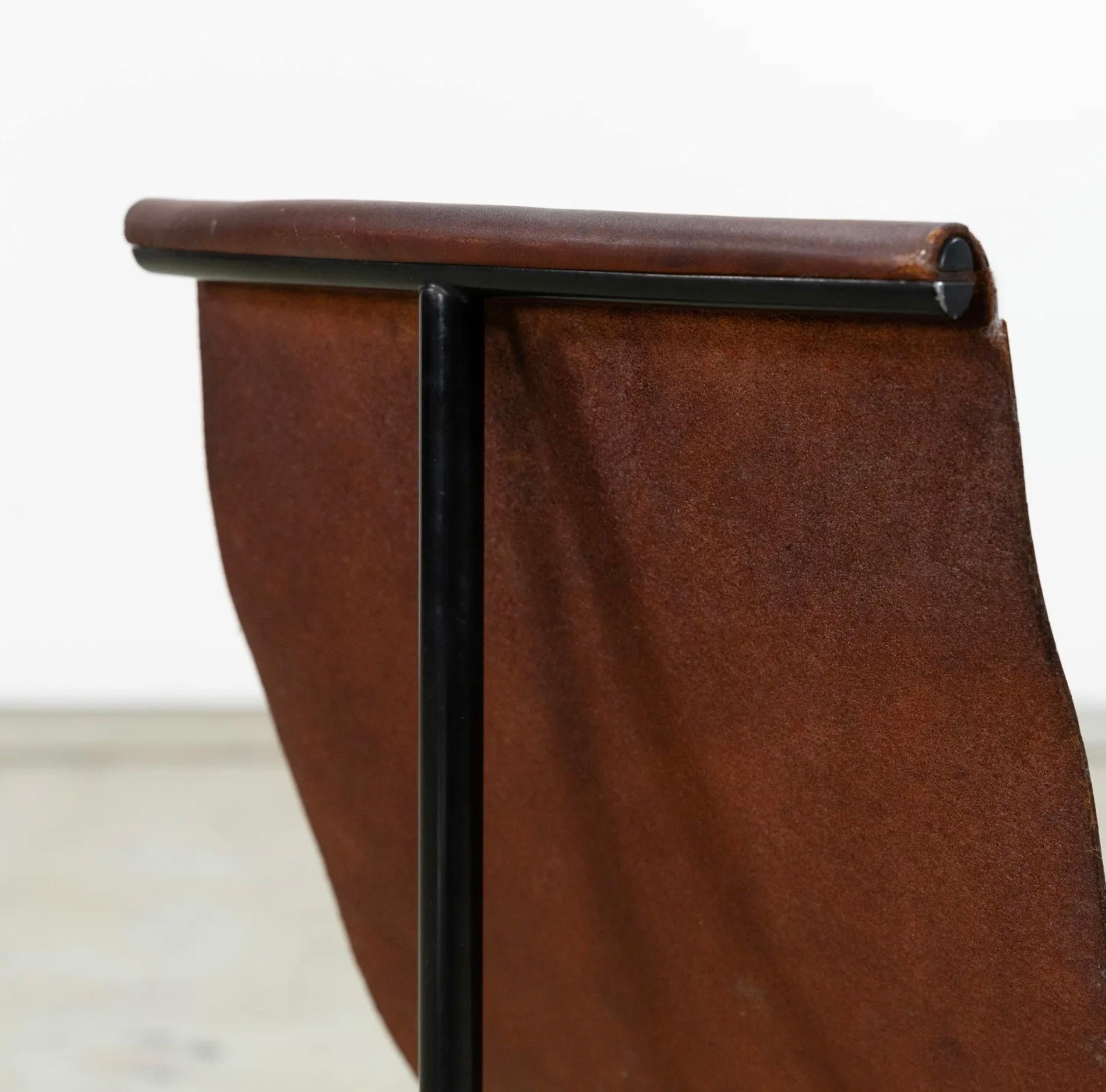 Katavolos, Kelley, and Littell, chair, black steel, enamelled steel and original cognac leather, United States, c. 1950.

A set of three-legged iconic mid-century modern leather chairs - both sculptural and functional. The leather is connected to