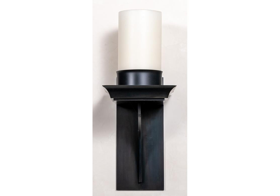 Kevin Reilly’s tall Cellar Sconce is candlelight distilled to its essence, in an electrified wax package. The candle is generous making it ideal for larger spaces. It casts a warm light upwards, just as a traditional wax candle would. It sits on a