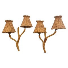 A pair of large 1950s bamboo wall sconces by Louis Sognot with orignal shades.