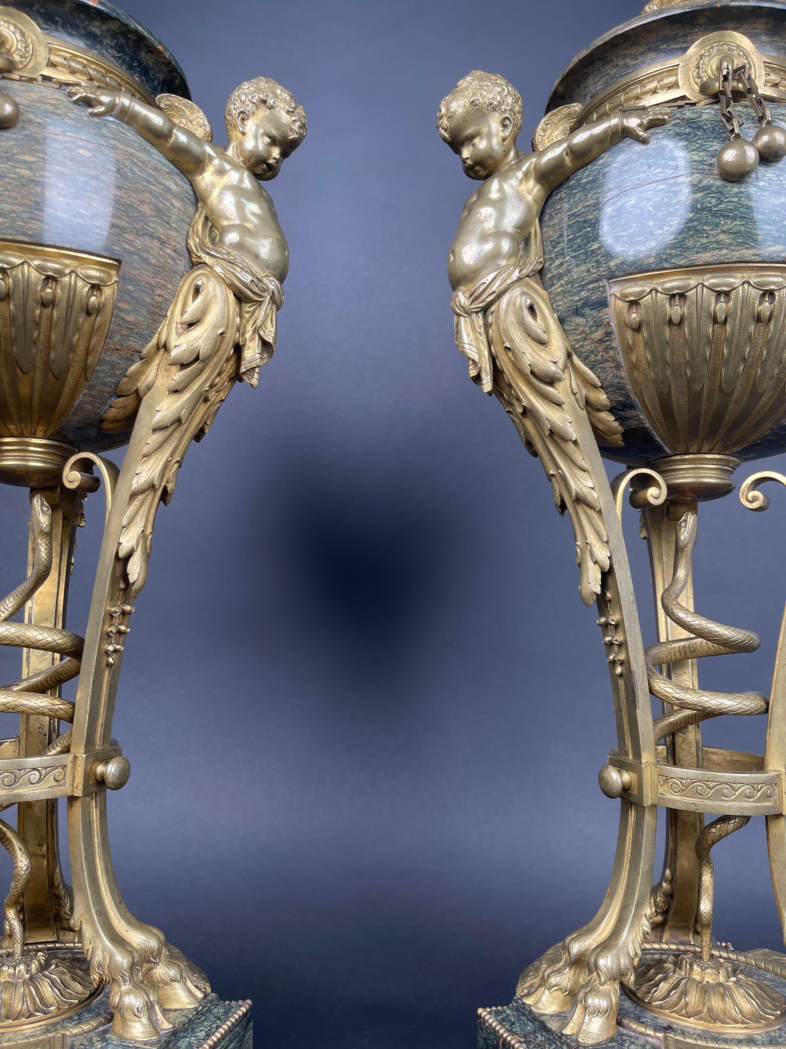 A Pair Of Large 19th century French Ormolu Mounted Obsidian Urns.

Attributed to Emmanuel-Alfred Beurdeley.

H: 27