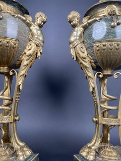 A Pair Of Large 19th century French Ormolu Mounted Obsidian Urns