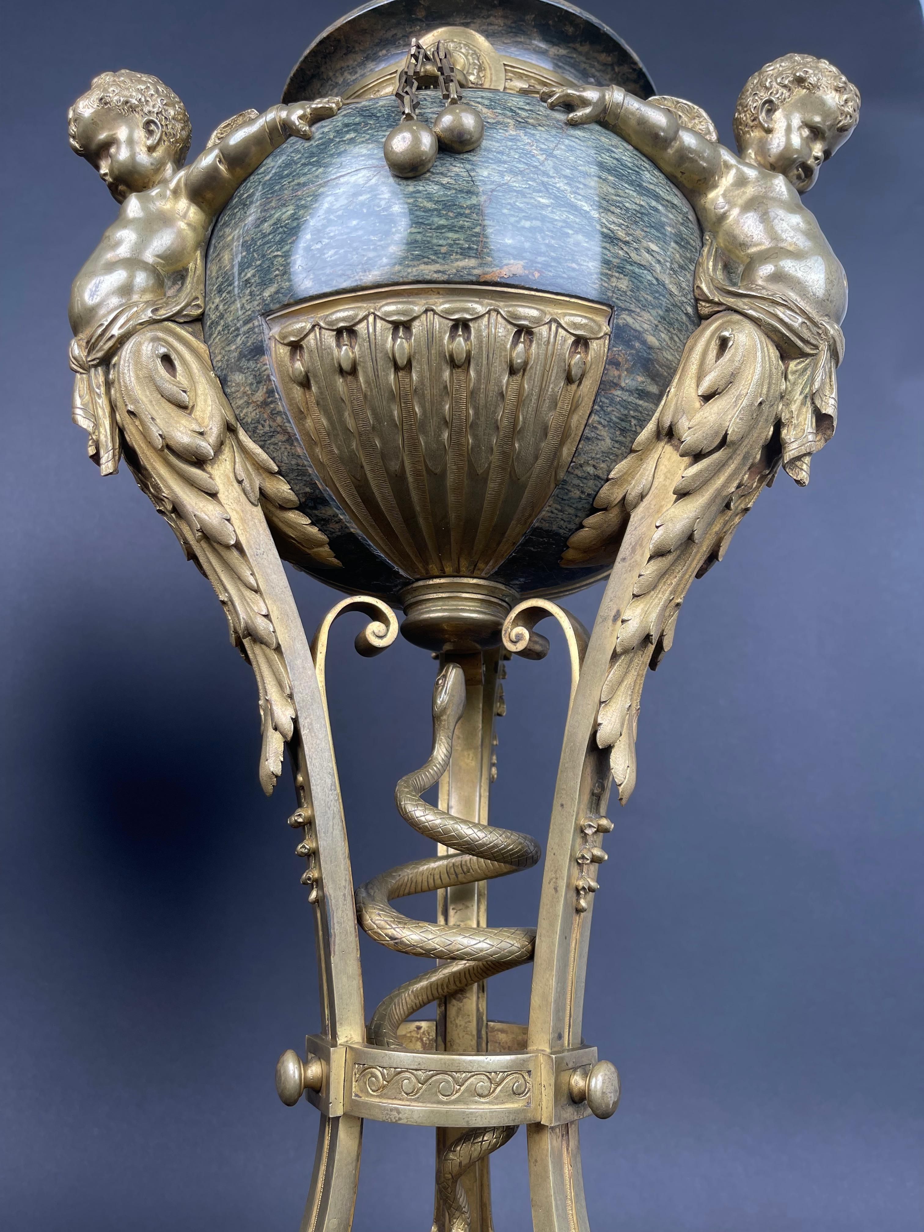 Hand-Carved A Pair Of Large 19th century French Ormolu Mounted Obsidian Urns For Sale