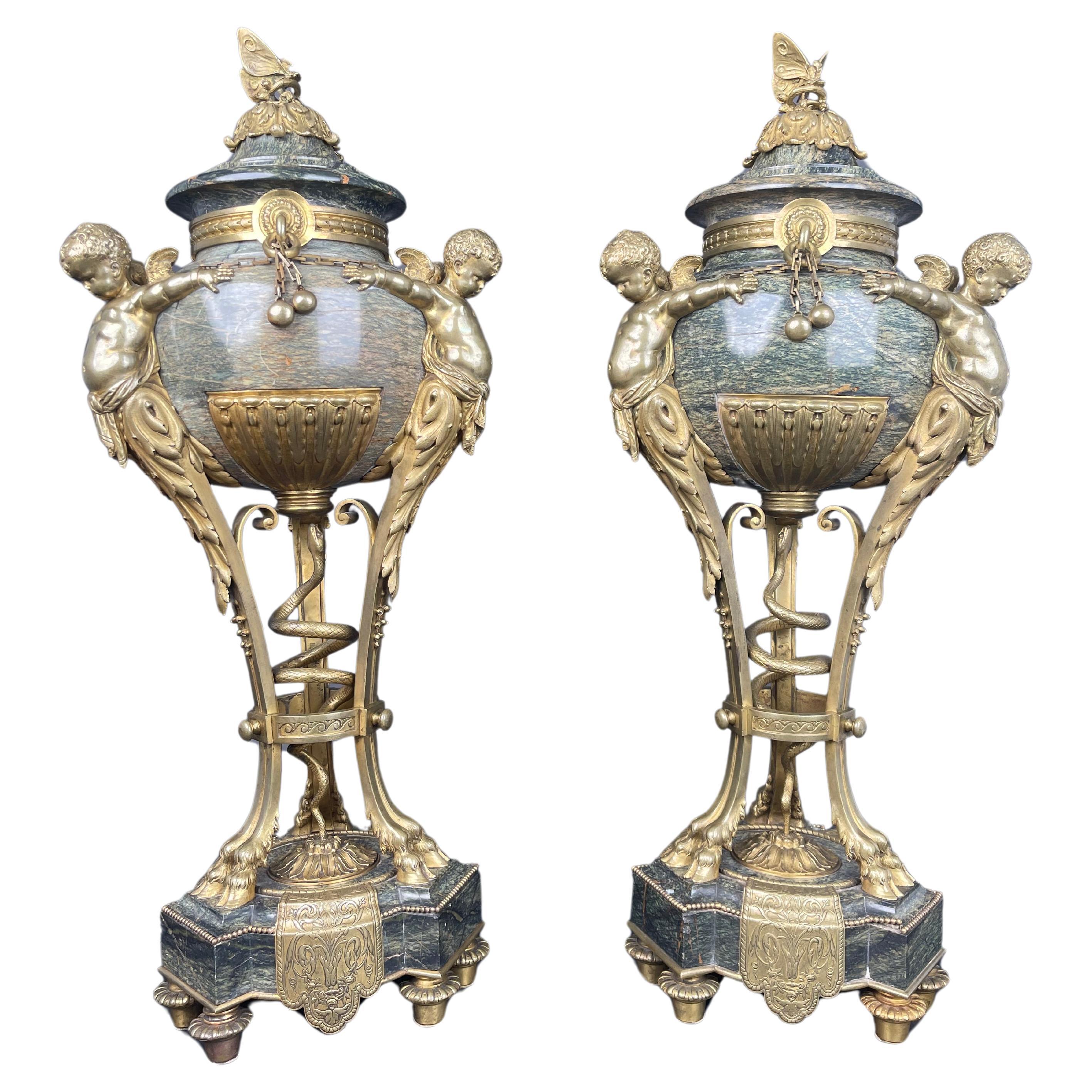 A Pair Of Large 19th century French Ormolu Mounted Obsidian Urns For Sale