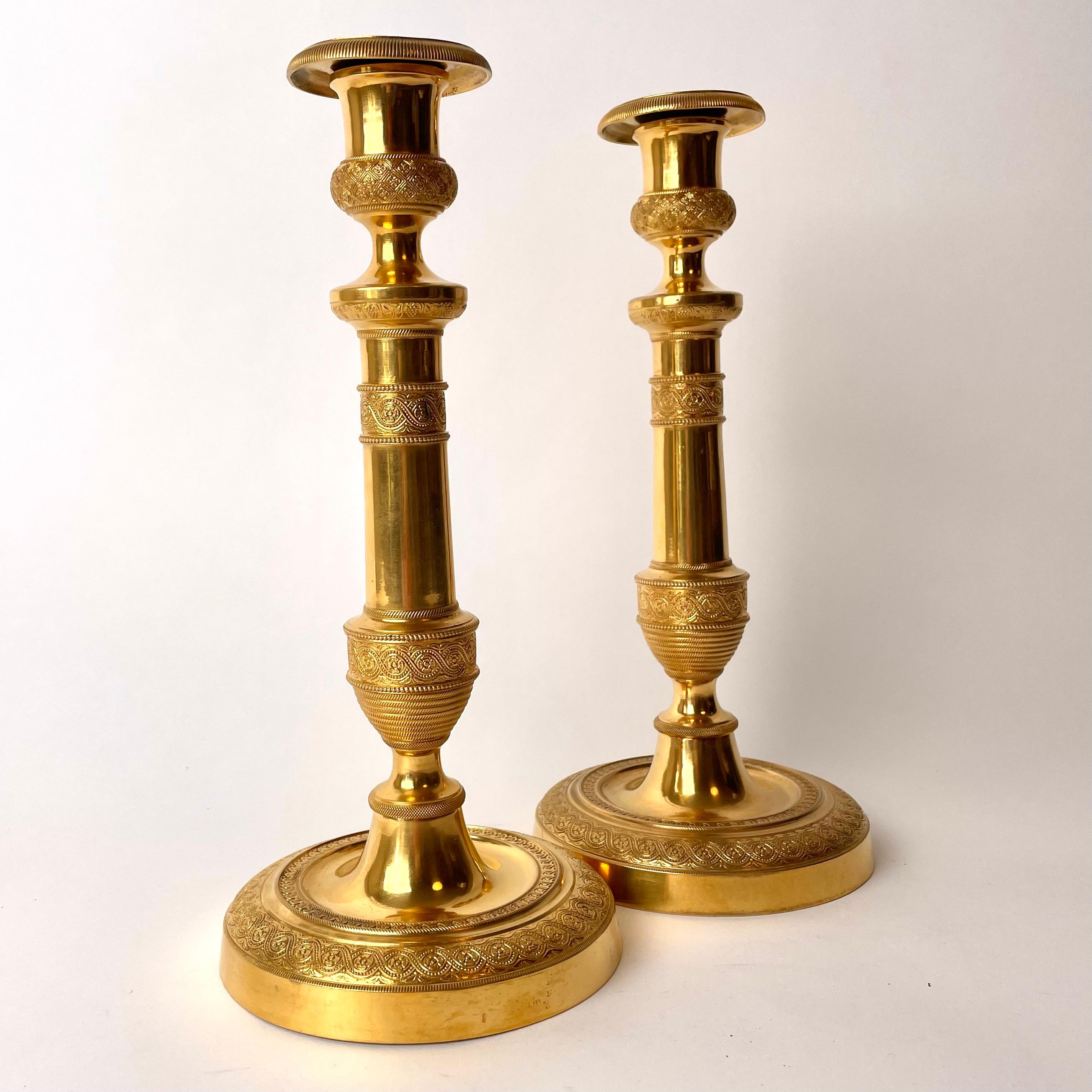 French Pair of Large and Sophisticated Empire Candlesticks in Gilded Bronze