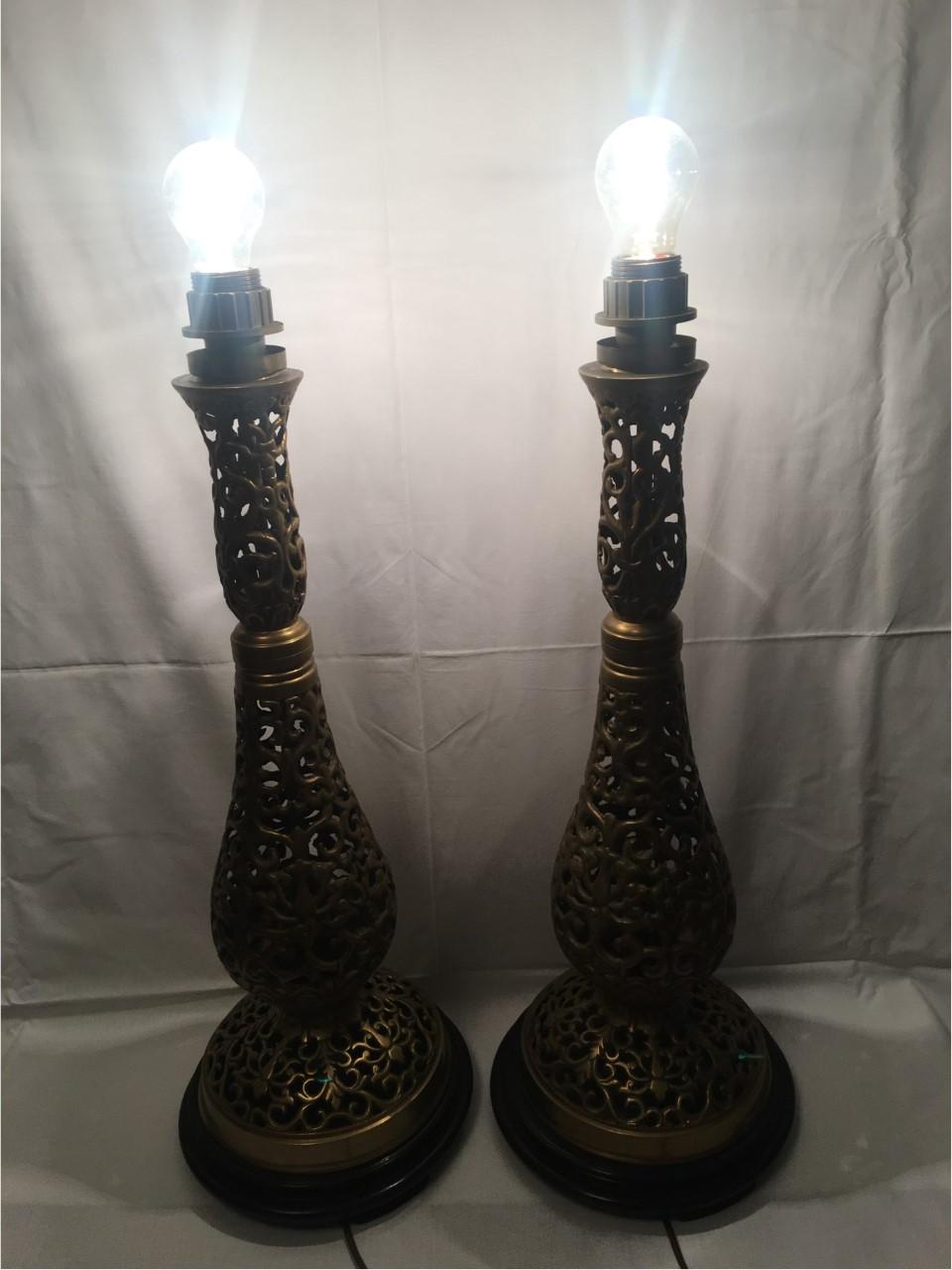 A set of large 1970s table lamps made of decorative copper mounted on round wooden bottom support pedestals. From the German Lamp Company Dora Leuchten. Each fixture requires one European E 26 / E27 Edison bulb, each bulb up to 75 watts. Good. In