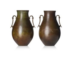 A pair of large bronze vases by GAB