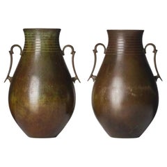 A pair of large bronze vases by GAB