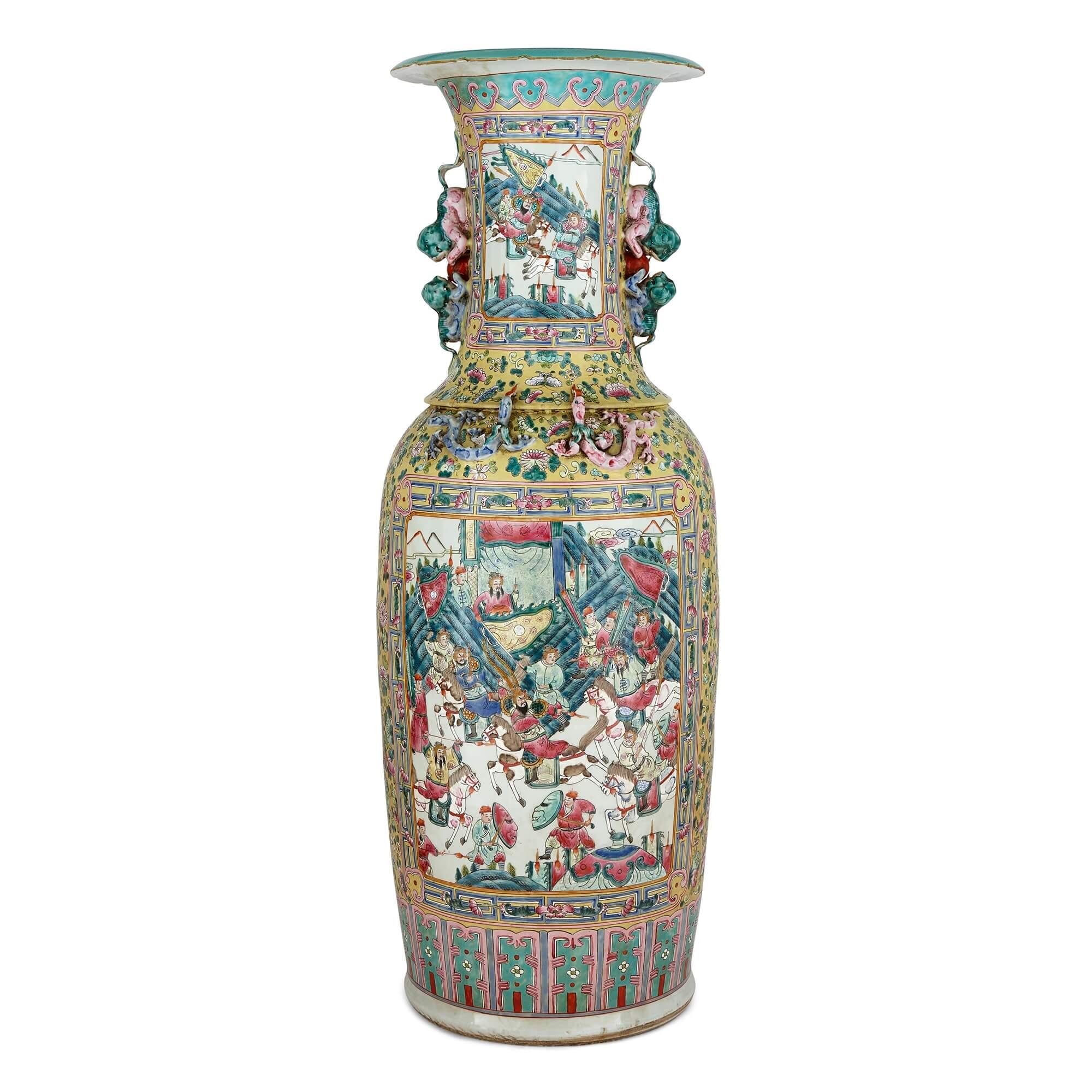 A pair of large Canton style famille jaune porcelain vases
Chinese, Late 19th Century
Height 120cm, diameter 42cm

These large and impressive vases are a pair of Canton-style famille jaune porcelain pieces, decorated with various and extensive