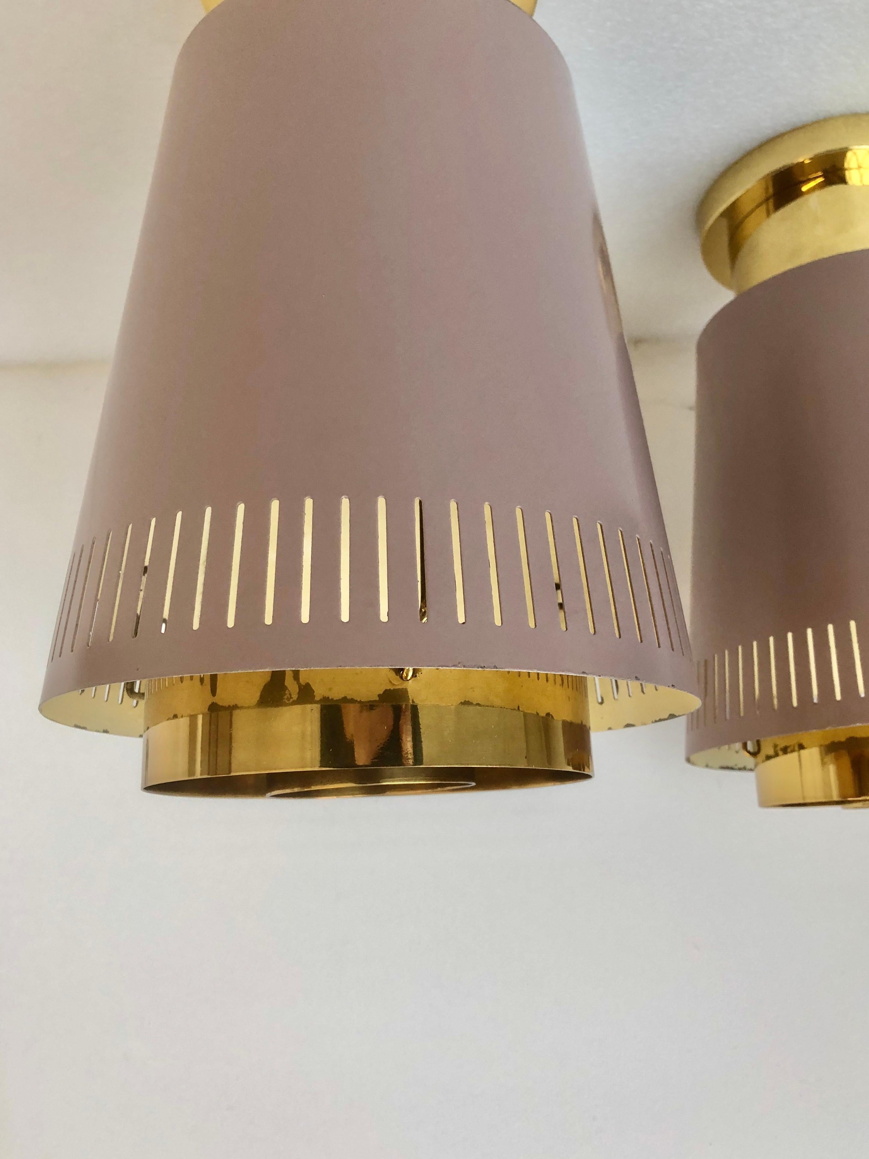 Finnish A pair of large  ceiling lights by Paavo Tynell, Model 9067 For Sale
