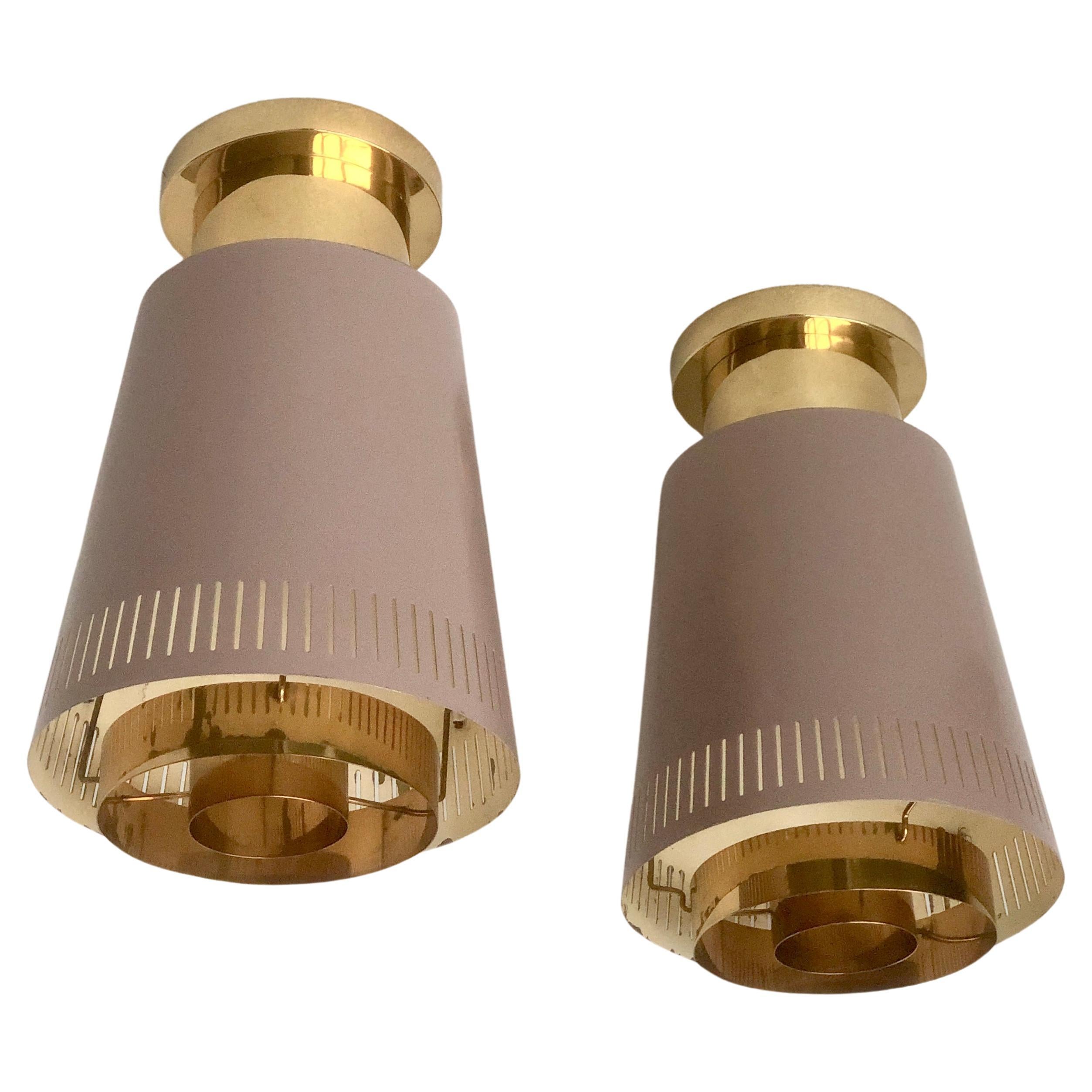 A pair of large  ceiling lights by Paavo Tynell, Model 9067 For Sale