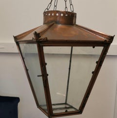 A Pair of Large Copper Hanging Lantern Lampshades