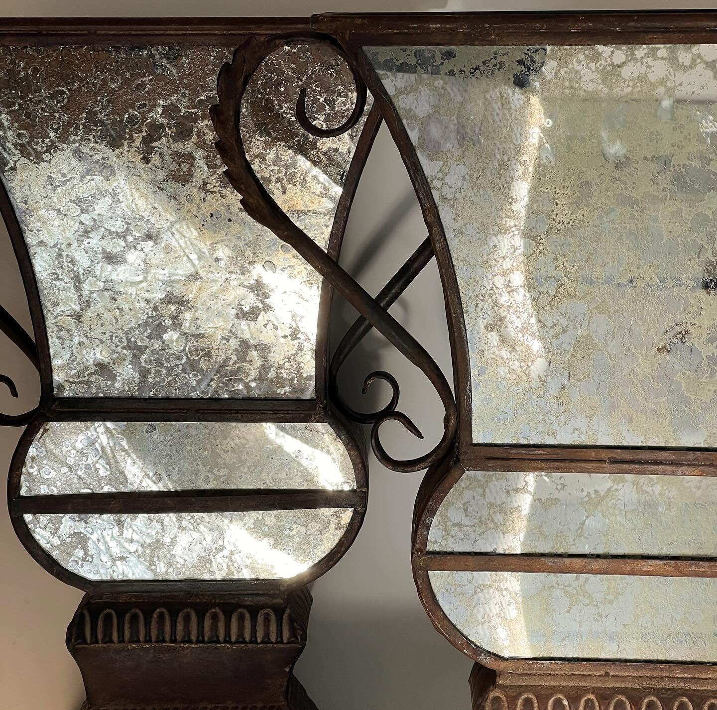 Beaux Arts A pair of large decorative iron and mirrored urns, 20th century For Sale