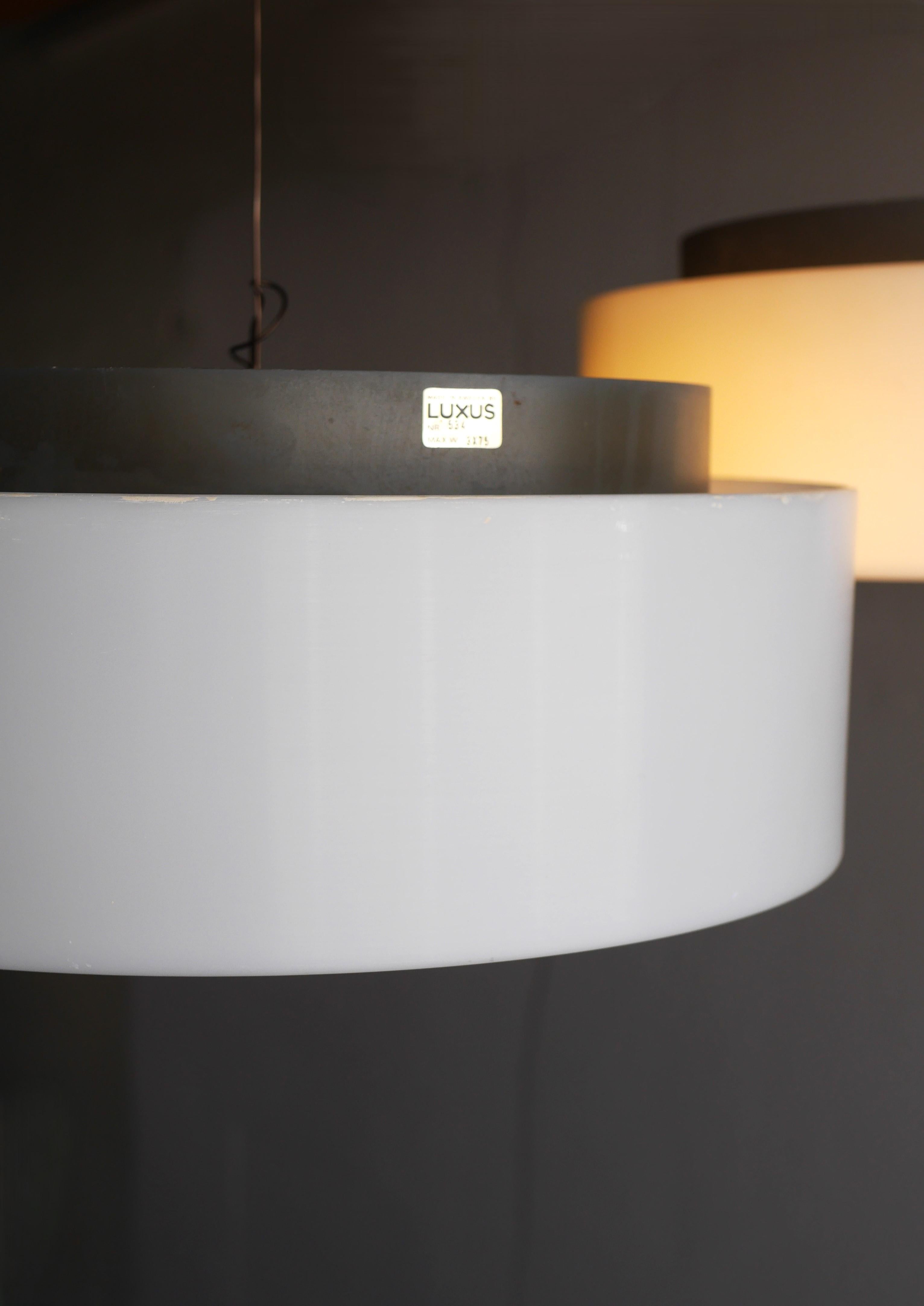 Paire de grandes lampes à disque de Luxus Sweden design by Uno & Östen Kristiansson en vente 7