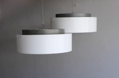 A pair of large Disc Lamps from Luxus Sweden design by Uno & Östen Kristiansson